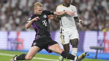Bayern's Matthijs de Ligt (left) and Real Madrid's Vinicius Junior had an absorbing duel. (AP PHOTO)